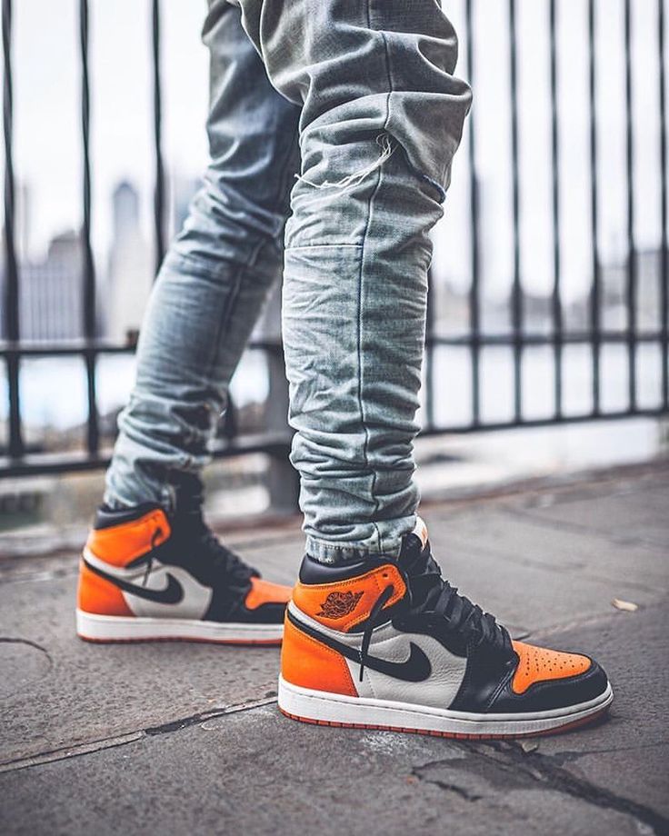 The Ultimate Guide to the Iconic Orange and Black Jordan 1s